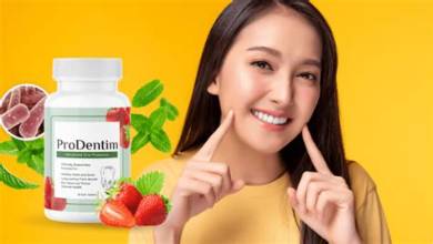 Woman smiling confidently next to ProDentim bottle